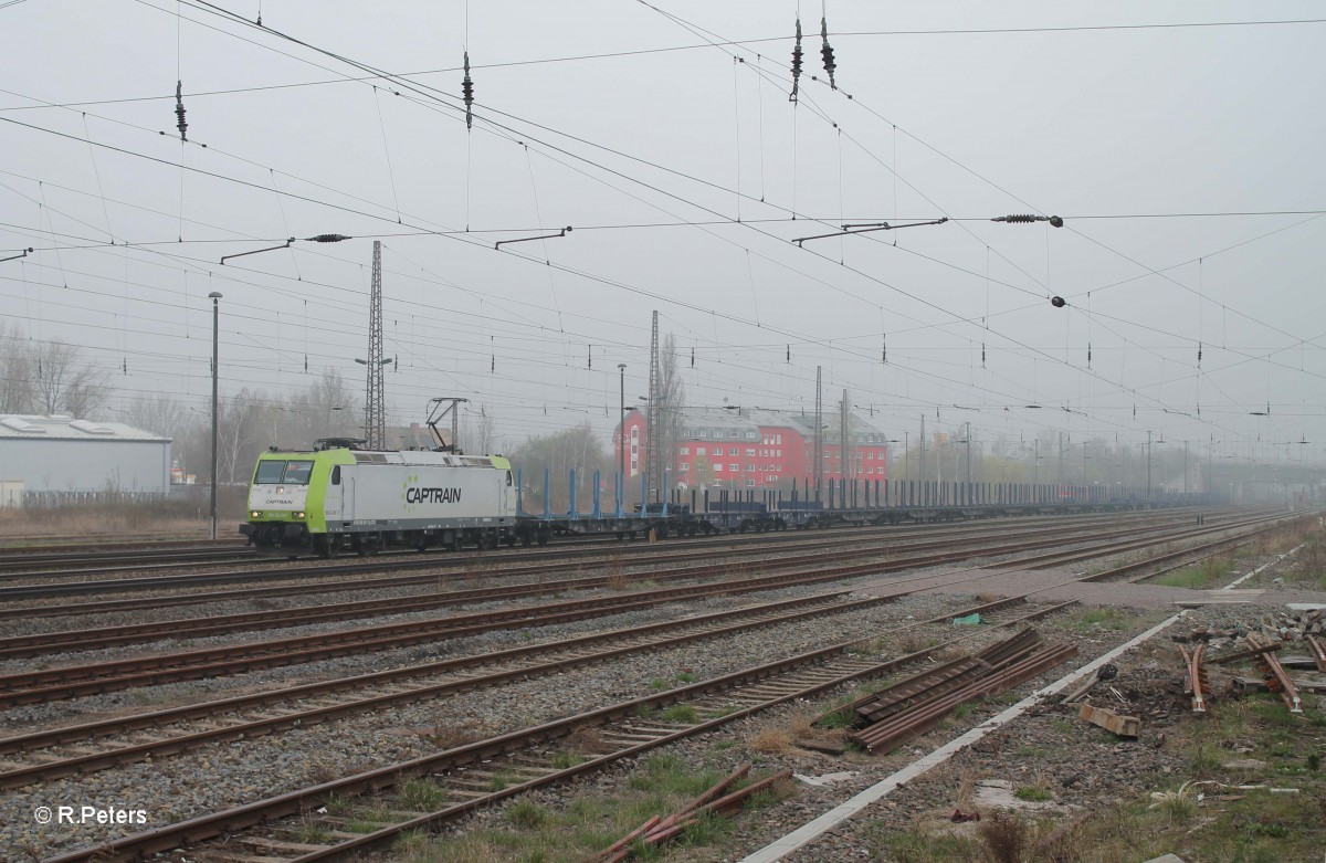 185 CL007 alias 185 507-1 Sir Rainer mit einem Stahlzug in Leipzig Schönefeld. 29.03.14