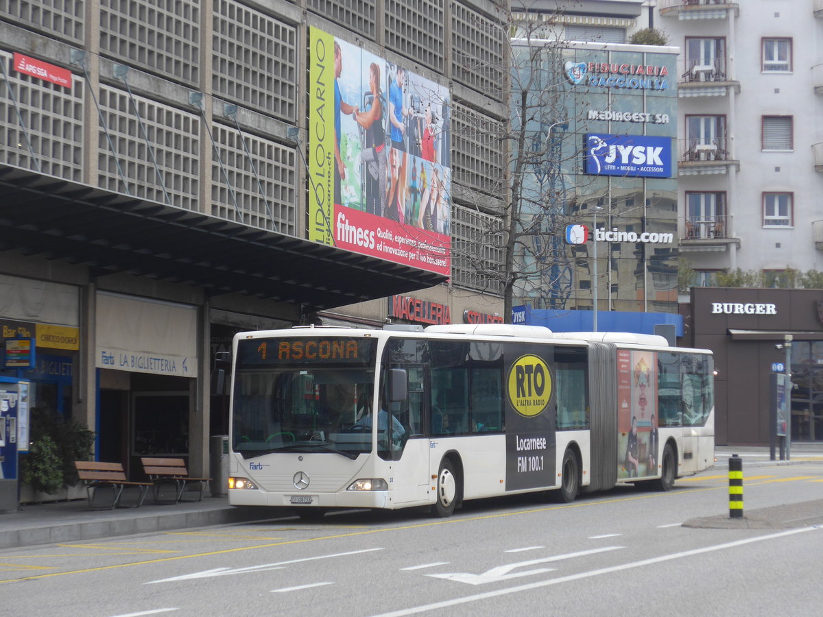 (188'837) - FART Locarno - Nr. 33/TI 128'733 - Mercedes (ex SBC Chur Nr. 92; ex ARL Viganello Nr. 23; ex TPL Lugano Nr. 29) am 17. Februar 2018 beim Bahnhof Locarno