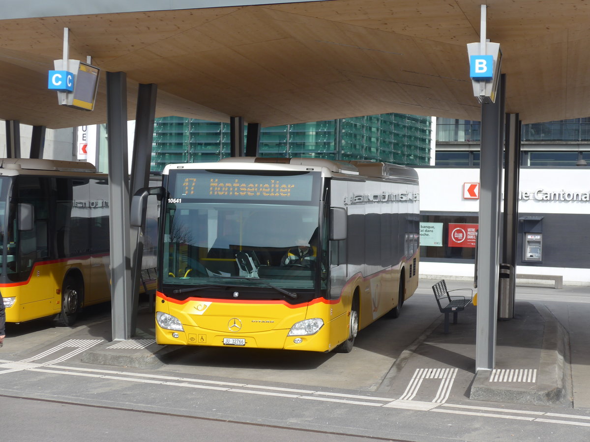 (189'873) - CarPostal Ouest - JU 32'766 - Mercedes (ex Nr. 26) am 2. April 2018 beim Bahnhof Delmont