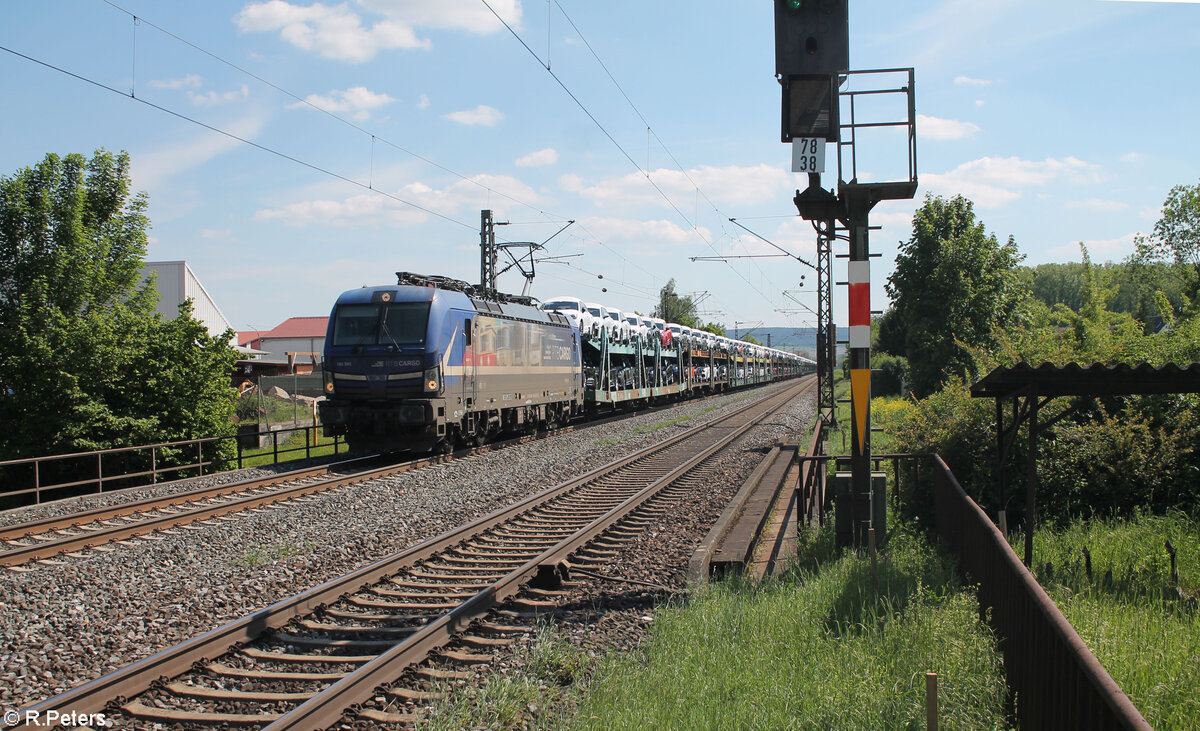 193 565  Evolution  mit einem Autotransportzug in Himmelstadt. 11.05.24