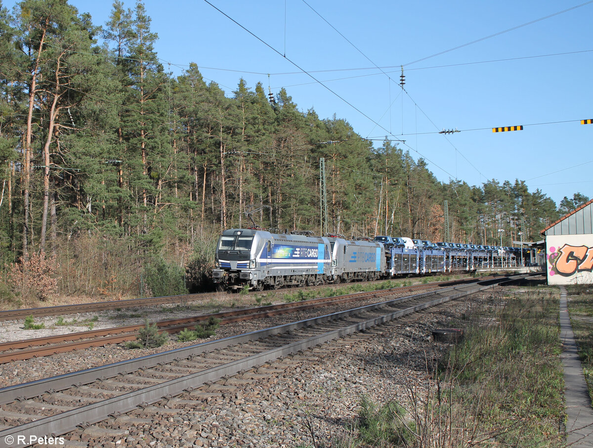 193 999-0  Györ  und 193 816-6 mit Autozug in Ochenbruck. 31.03.24