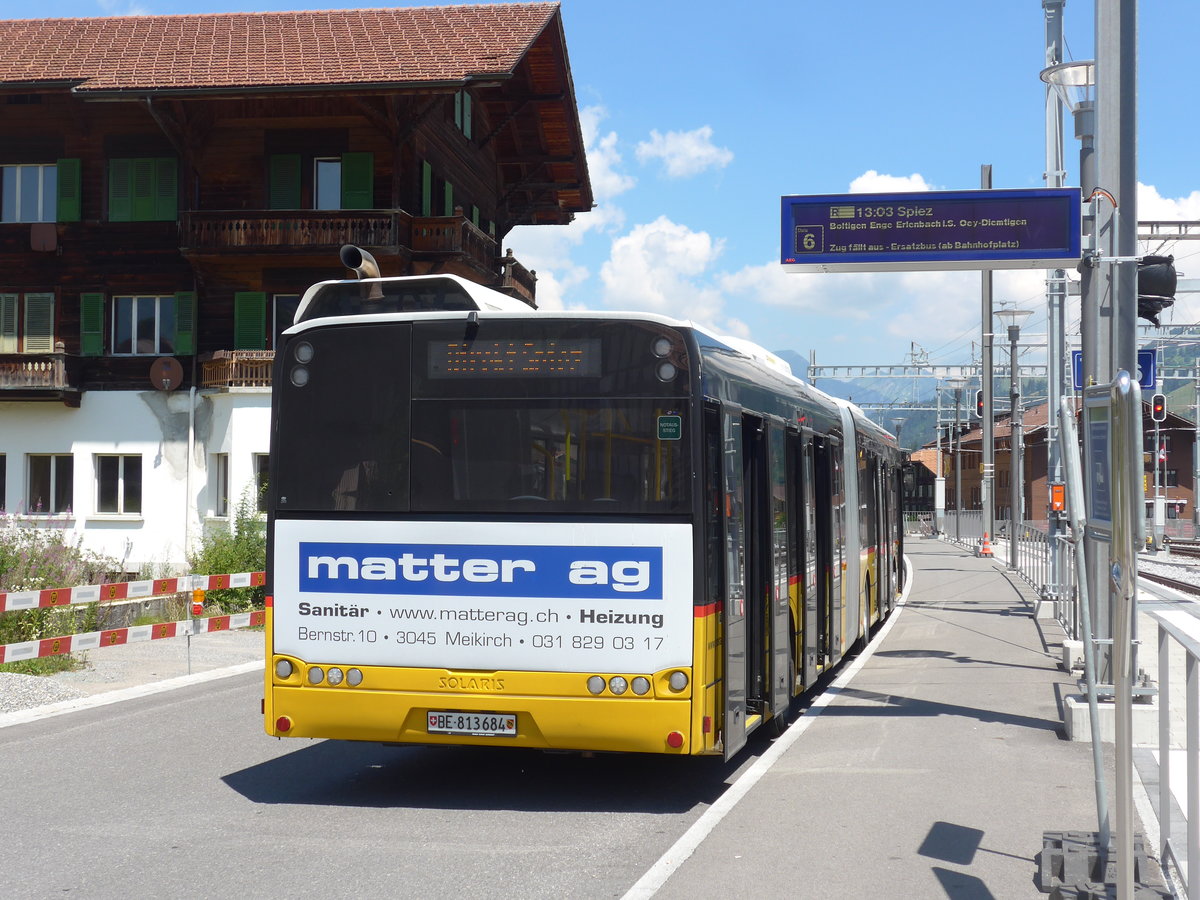 (194'682) - PostAuto Bern - Nr. 684/BE 813'684 - Solaris am 9. Juli 2018 beim Bahnhof Zweisimmen