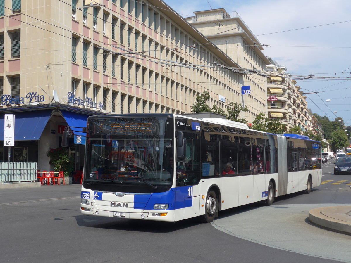 (195'759) - TL Lausanne - Nr. 689/VD 1582 - MAN am 6. August 2018 beim Bahnhof Lausanne