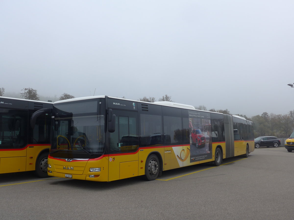 (199'197) - CarPostal Ouest - JU 52'075 - MAN (ex Nr. 35) am 4. November 2018 in Develier, Parkplatz