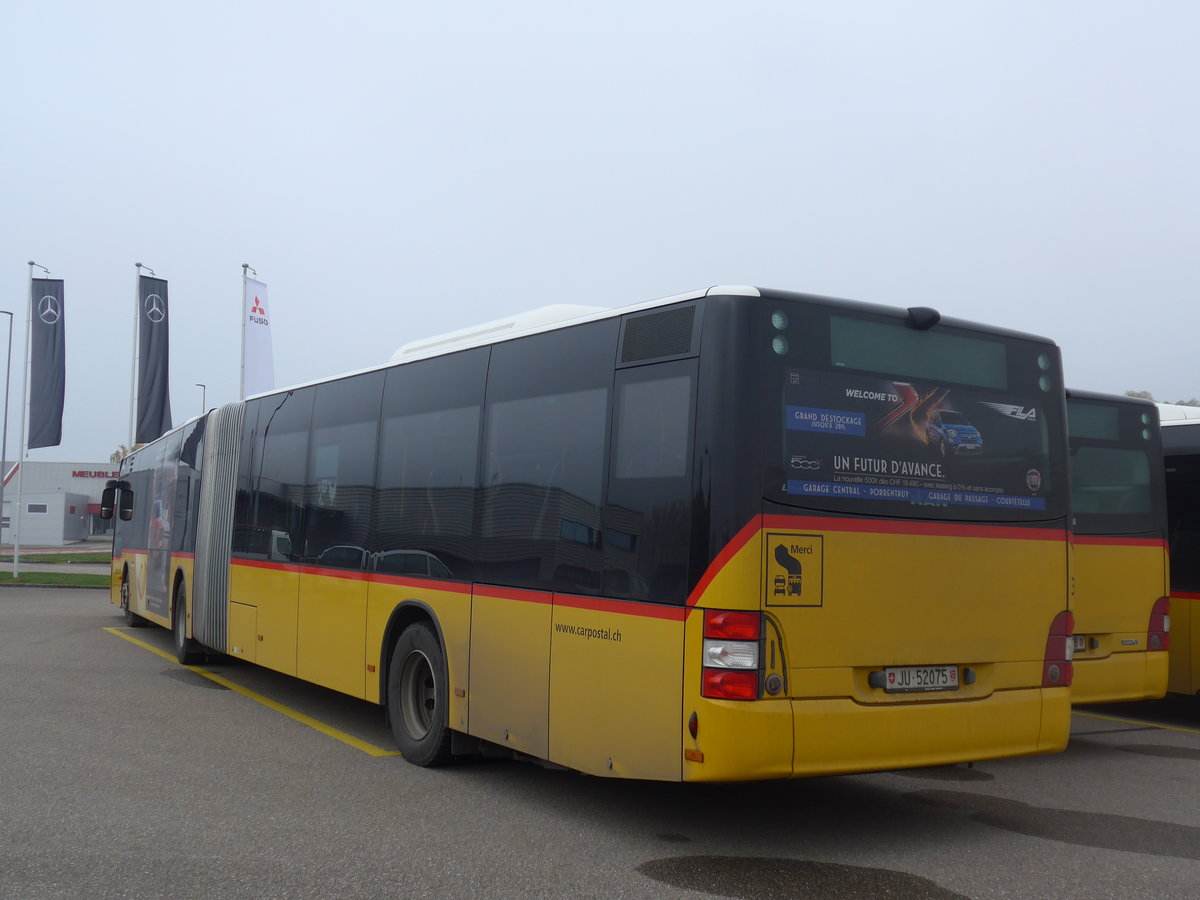 (199'234) - CarPostal Ouest - JU 52'075 - MAN (ex Nr. 35) - MAN am 4. November 2018 in Develier, Parkplatz