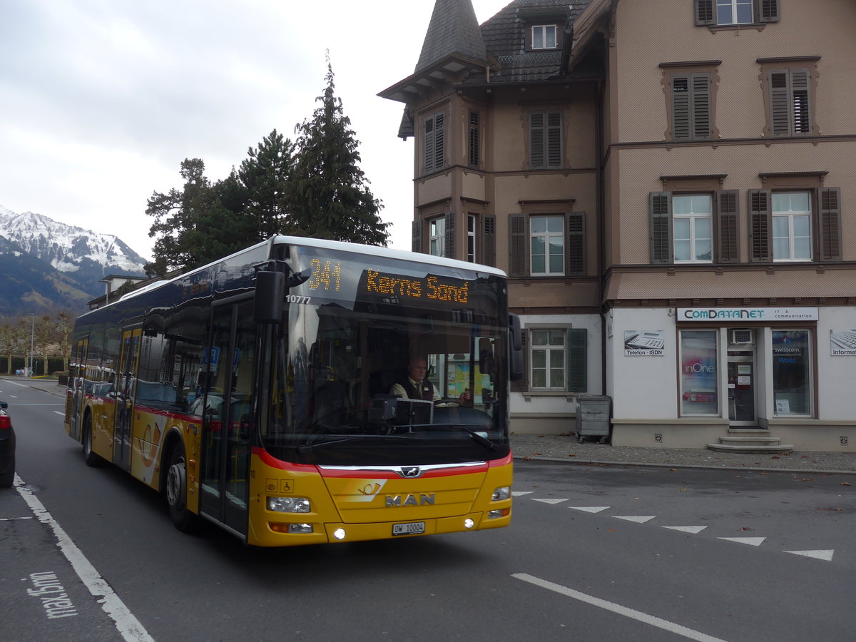 (199'848) - Dillier, Sarnen - Nr. 10/OW 10'004 - MAN am 8. Dezember 2018 beim Bahnhof Sarnen