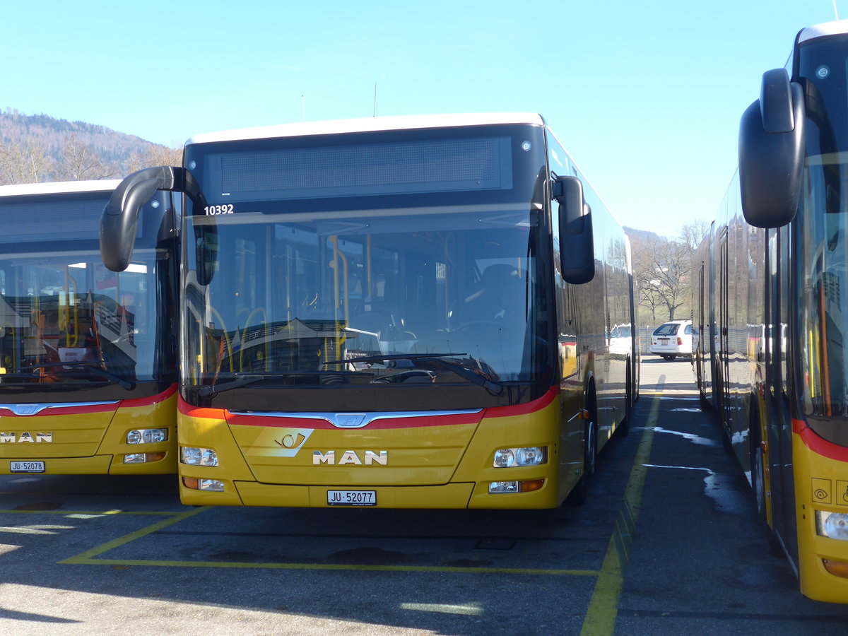 (201'588) - CarPostal Ouest - JU 52'077 - MAN (ex Nr. 74) am 16. Februar 2019 in Develier, Parkplatz