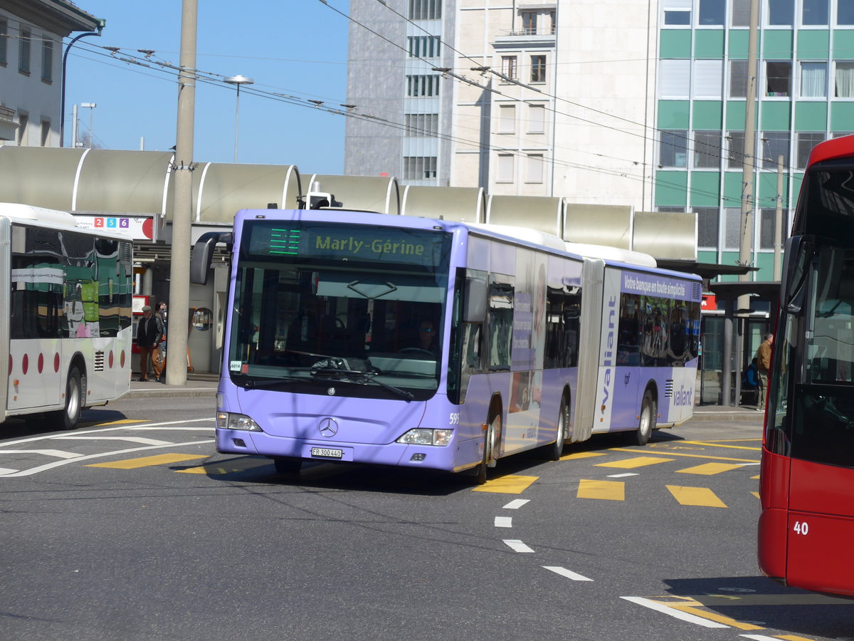 (203'250) - TPF Fribourg - Nr. 595/FR 300'440 - Mercedes am 24. Mrz 2019 beim Bahnhof Fribourg