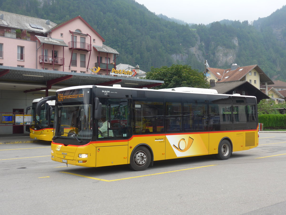 (207'661) - PostAuto Bern - BE 407'862 - MAN/Gppel (ex AVG Meiringen Nr. 62) am 9. Juli 2019 in Meiringen, Postautostation