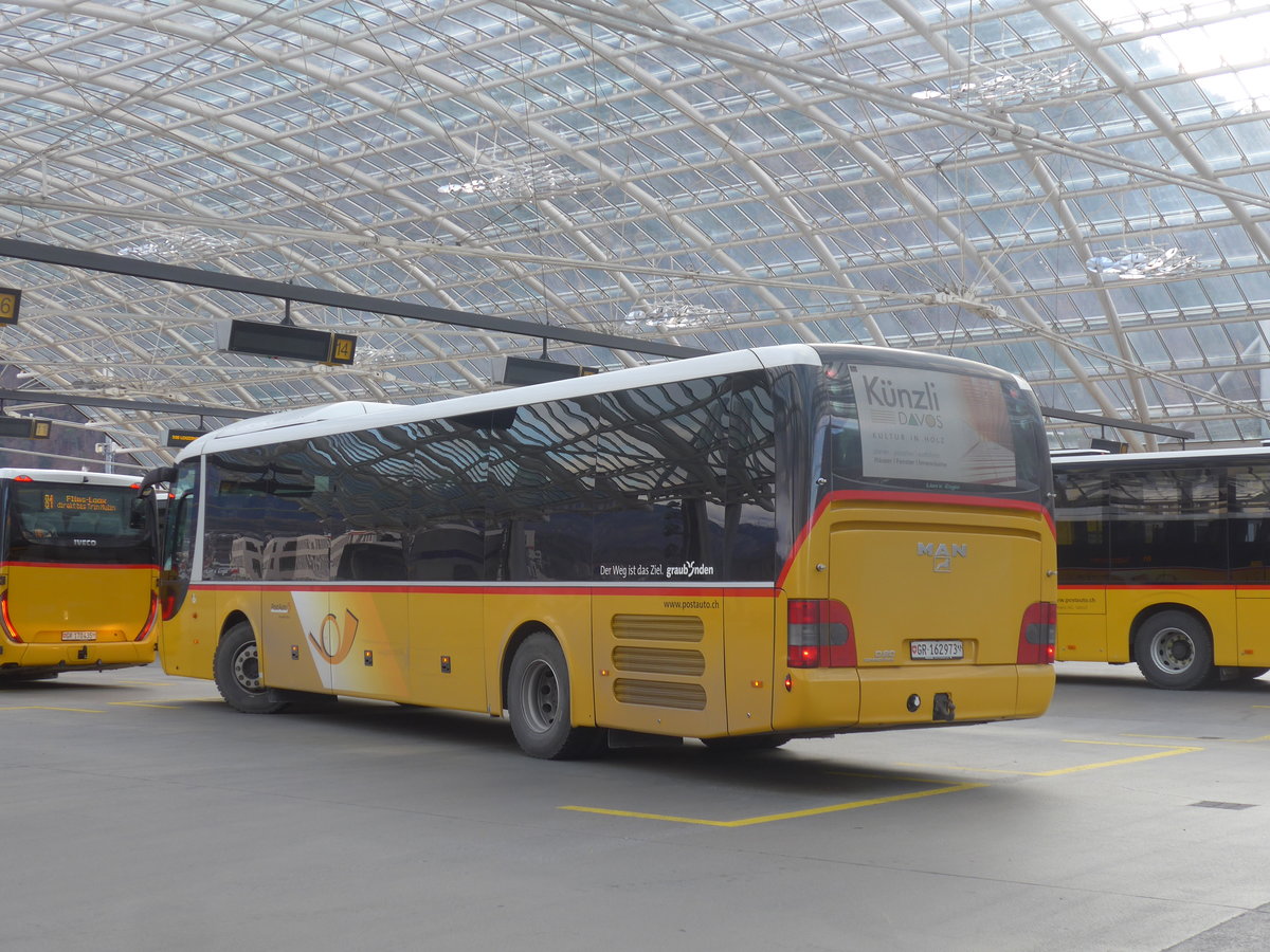 (212'557) - PostAuto Graubnden - GR 162'973 - MAN am 7. Dezember 2019 in Chur, Postautostation