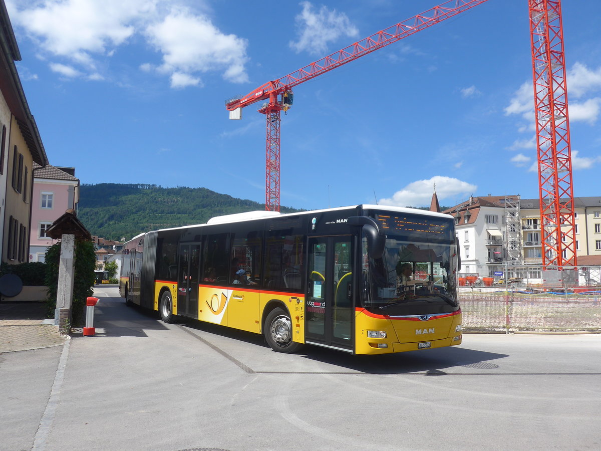 (218'384) - CarPostal Ouest - JU 52'075 - MAN (ex Nr. 35) am 4. Juli 2020 beim Bahnhof Delmont