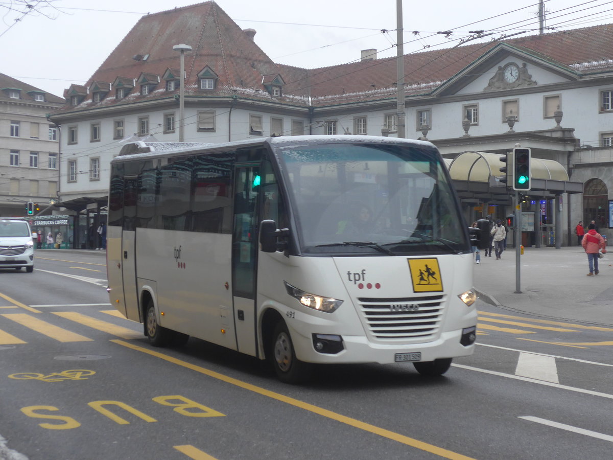 (223'536) - TPF Fribourg - Nr. 491/FR 301'509 - Iveco/ProBus am 12. Februar 2021 beim Bahnhof Fribourg