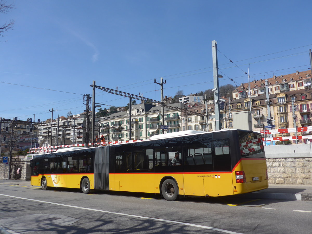 (224'604) - PostAuto Bern - Nr. 665/NE 165'366 - MAN (ex BE 656'302) am 29. Mrz 2021 beim Bahnhof Neuchtel (Einsatz CarPostal)