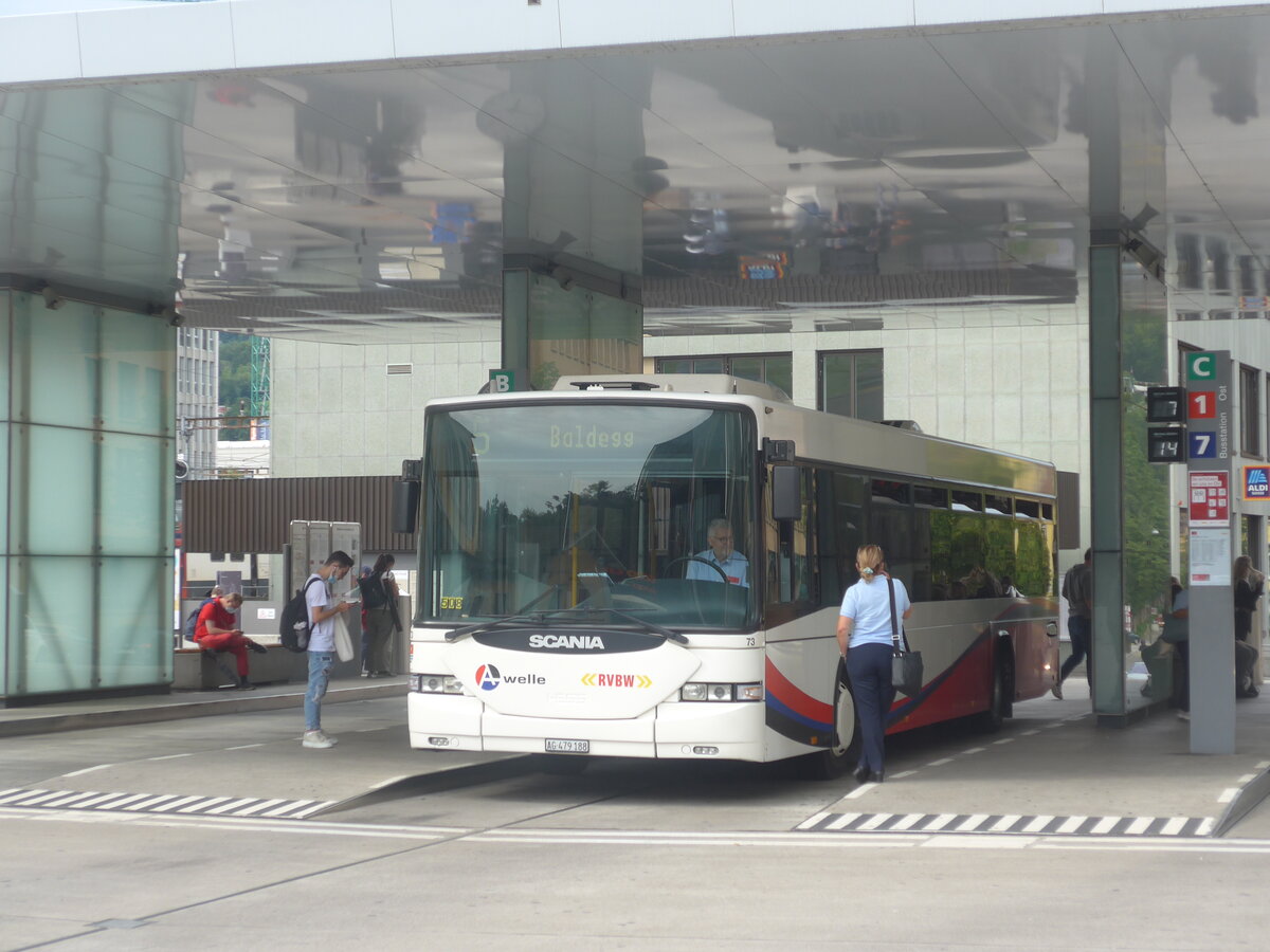 (227'247) - RVBW Wettingen - Nr. 73/AG 479'188 - Scania/Hess (ex MAN, Otelfingen; ex RVBW Wettingen Nr. 73) am 9. August 2021 beim Bahnhof Baden