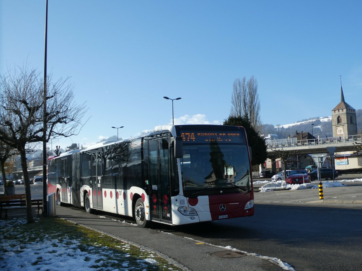 (231'264) - TPF Fribourg - Nr. 162/FR 300'244 - Mercedes am 14. Dezember 2021 beim Bahnhof Moudon