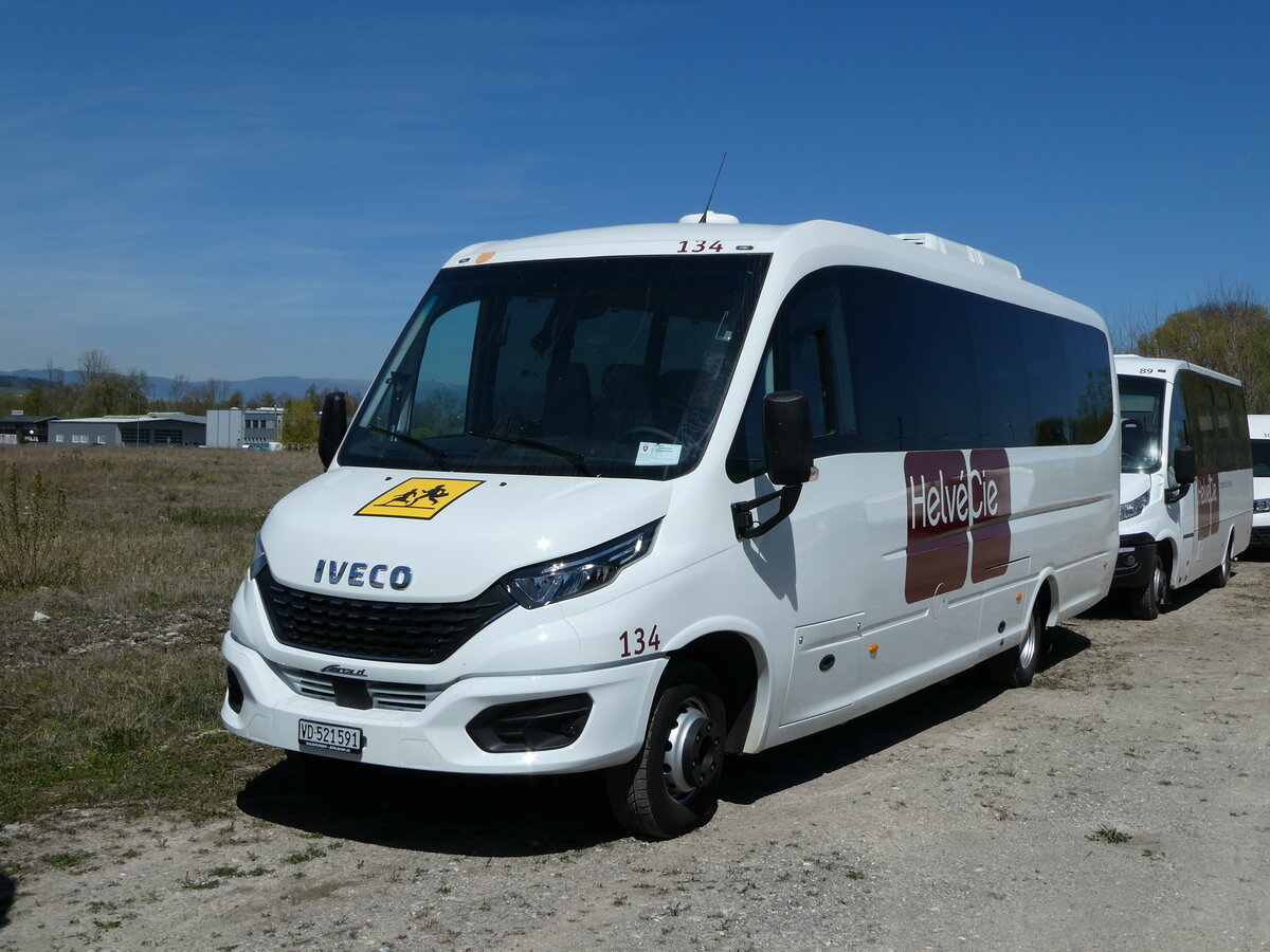 (234'769) - HelvCie, Satigny - Nr. 134/VD 521'591 - Iveco am 18. April 2022 in Avenches, Route Industrielle