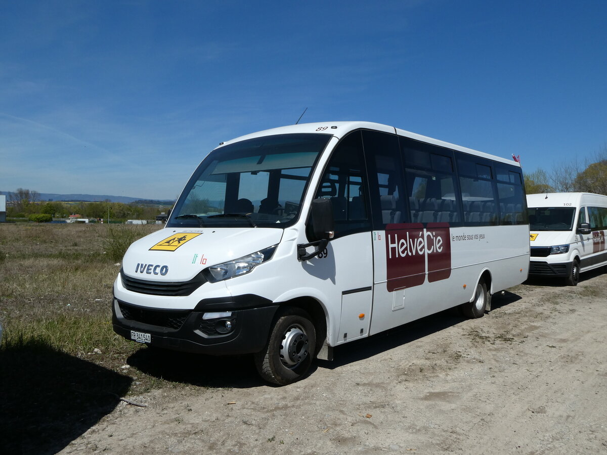 (234'770) - HelvCie, Satigny - N. 89/FR 341'540 - Iveco am 18. April 2022 in Avenches, Route Industrielle