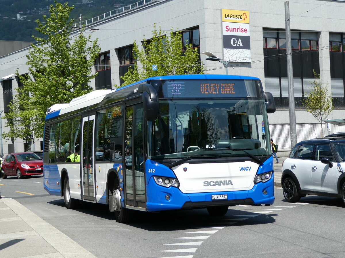 (234'958) - VMCV Clarens - Nr. 412/VD 316'597 - Scania am 30. April 2022 beim Bahnhof Vevey