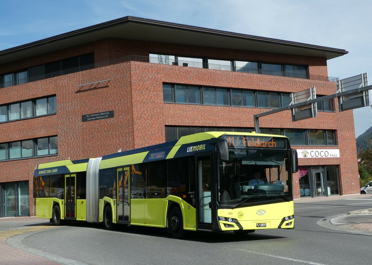 (240'966) - BOS PS Anstalt, Vaduz - Nr. 573/FL 40'231 - Solaris am 11. Oktober 2022 beim Bahnhof Schaan