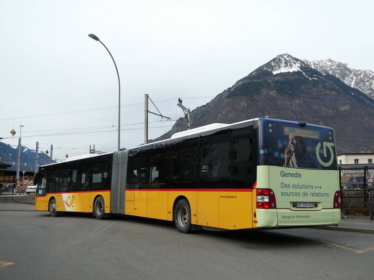 (245'063) - PostAuto Wallis - Nr. 52/VS 358'319/PID 11'211 - MAN (ex TMR Martigny Nr. 142) am 14. Januar 2023 beim Bahnhof Martigny