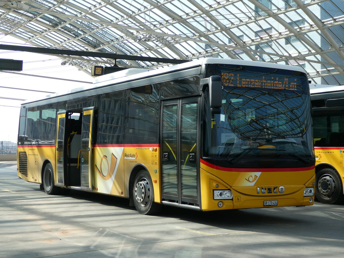 (246'826) - PostAuto Graubnden - GR 170'434/PID 10'310 - Iveco (ex Lagerfahrzeug Iveco) am 3. Mrz 2023 in Chur, Postautostation