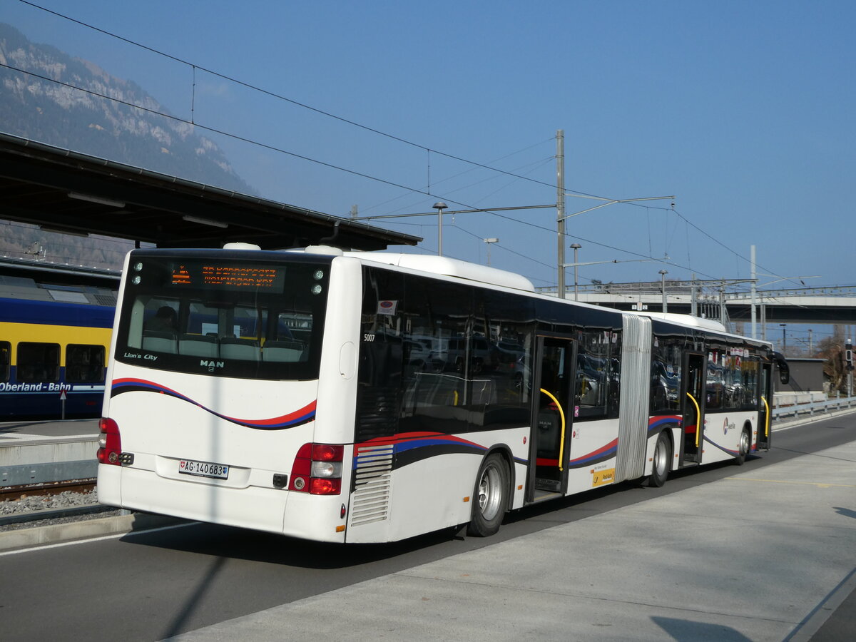 (246'909) - PostAuto Norschweiz - AG 140'683/PID 5007 - MAN (ex Steffen, Remetschwil Nr. 58) am 5. März 2023 beim Bahnhof Interlaken Ost