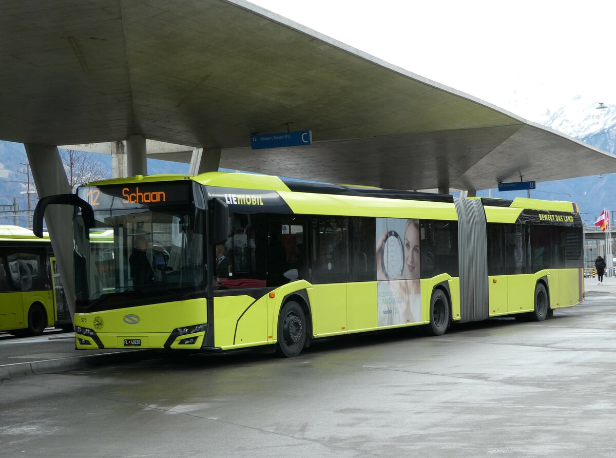 (246'996) - Aus Liechtenstein: BOS PS Anstalt, Vaduz - Nr. 570/FL 40'228 - Solaris am 9. März 2023 beim Bahnhof Buchs