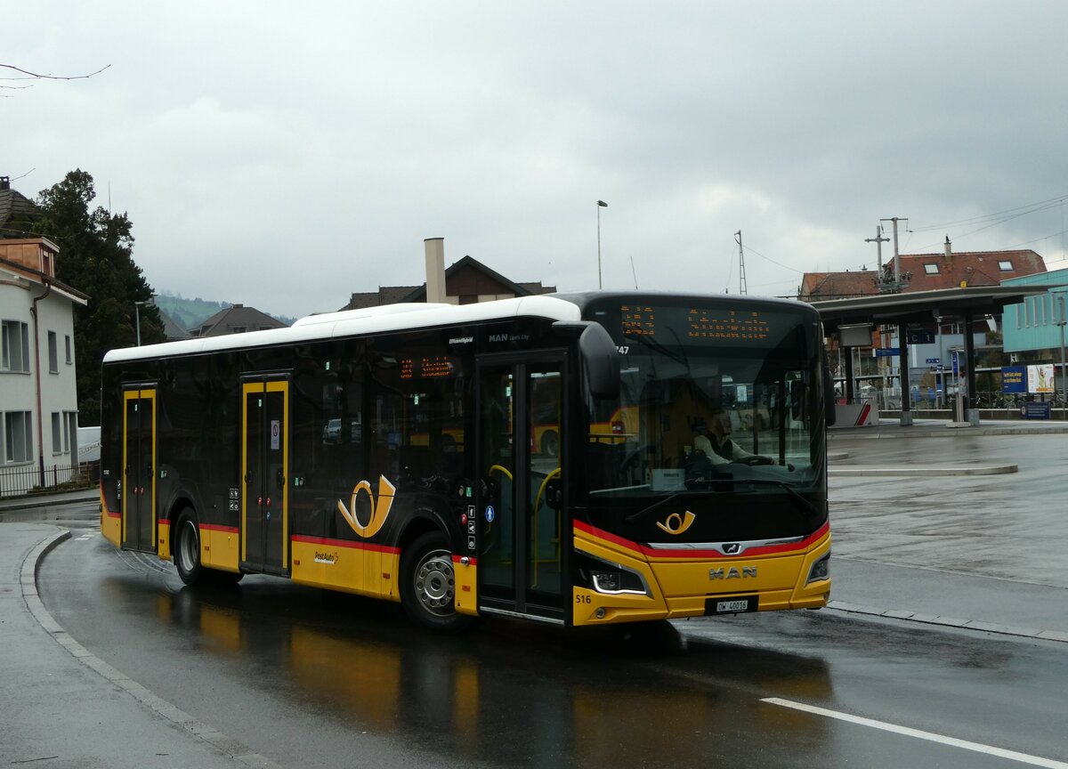 (247'579) - PostAuto Zentralschweiz - Nr. 516/OW 40'016/PID 11'747 - MAN (ex Nr. 16) am 24. Mrz 2023 beim Bahnhof Sarnen