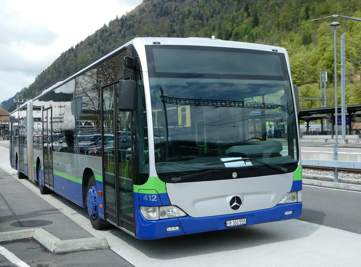 (249'382) - Intertours, Domdidier - Nr. 412/FR 300'555 - Mercedes (ex TPL Lugano Nr. 412) am 2. Mai 2023 beim Bahnhof Interlaken Ost