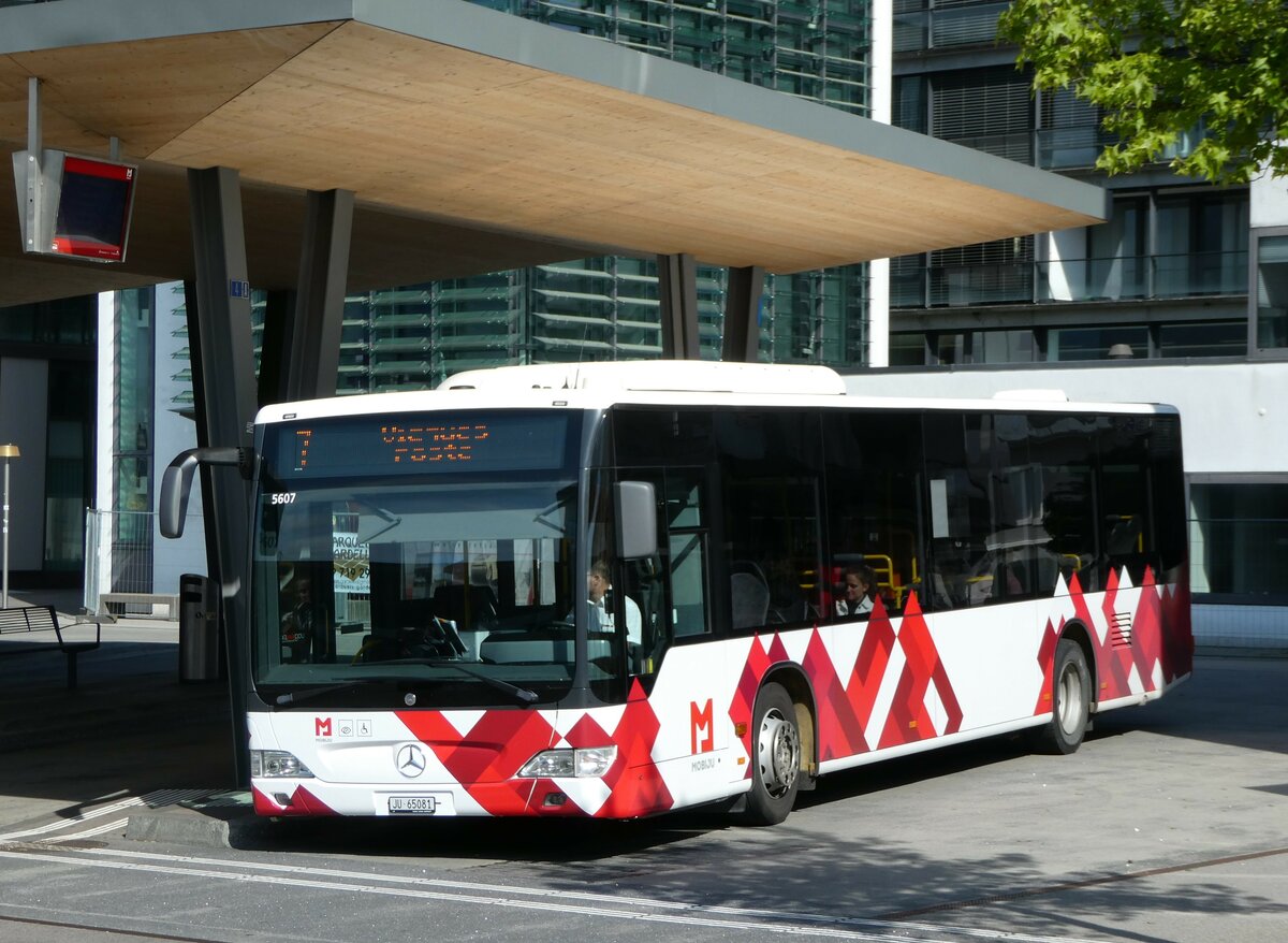 (250'136) - CarPostal Ouest - JU 65'081/PID 5607 - Mercedes (ex Nr. 14) am 18. Mai 2023 beim Bahnhof Delmont