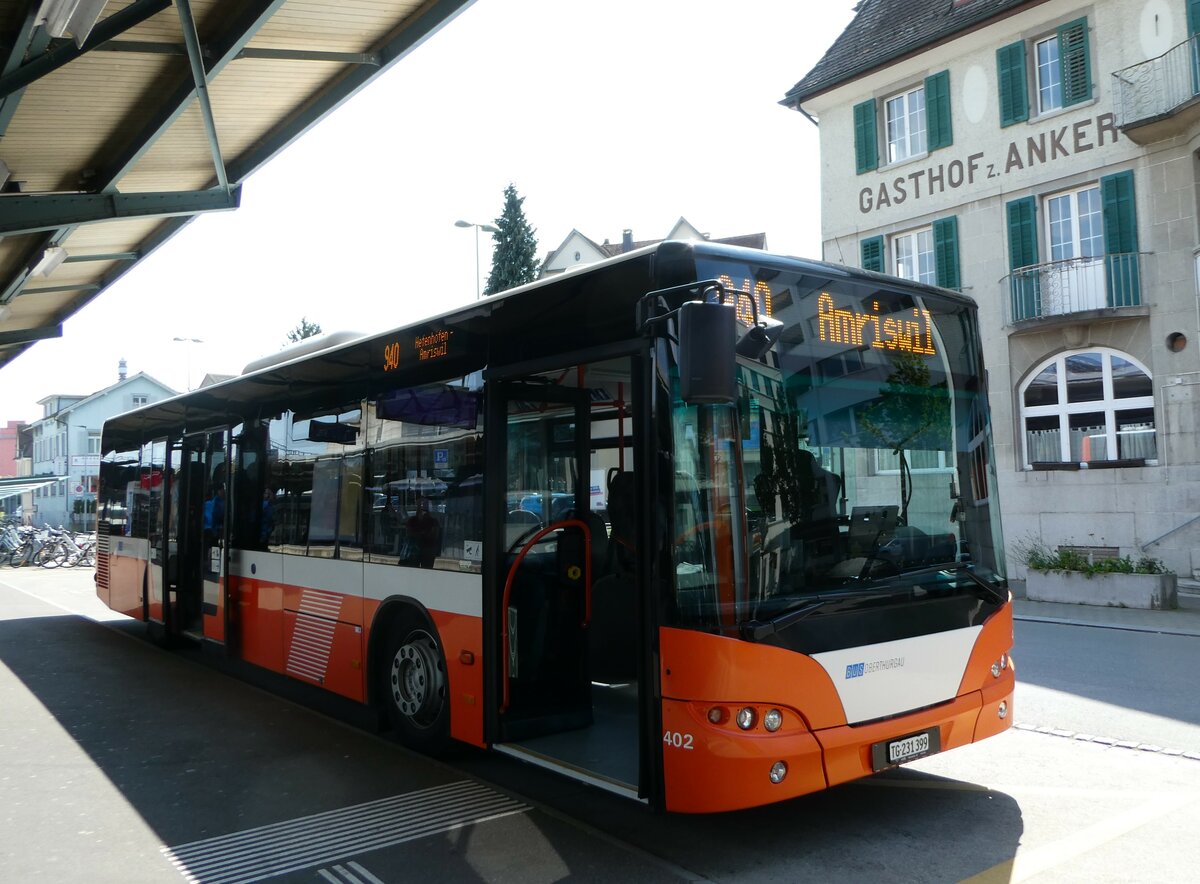 (250'827) - BOTG Amriswil - Nr. 402/TG 231'399 - Neoplan (ex Nr. 6) am 30. Mai 2023 beim Bahnhof Romanshorn