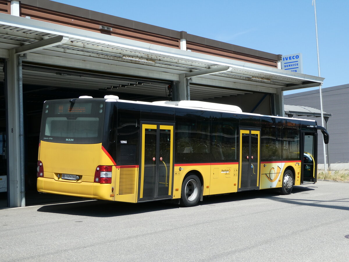 (252'409) - PostAuto Nordschweiz - BL 140'639/PID 10'966 - MAN am 7. Juli 2023 in Laufen, Garage