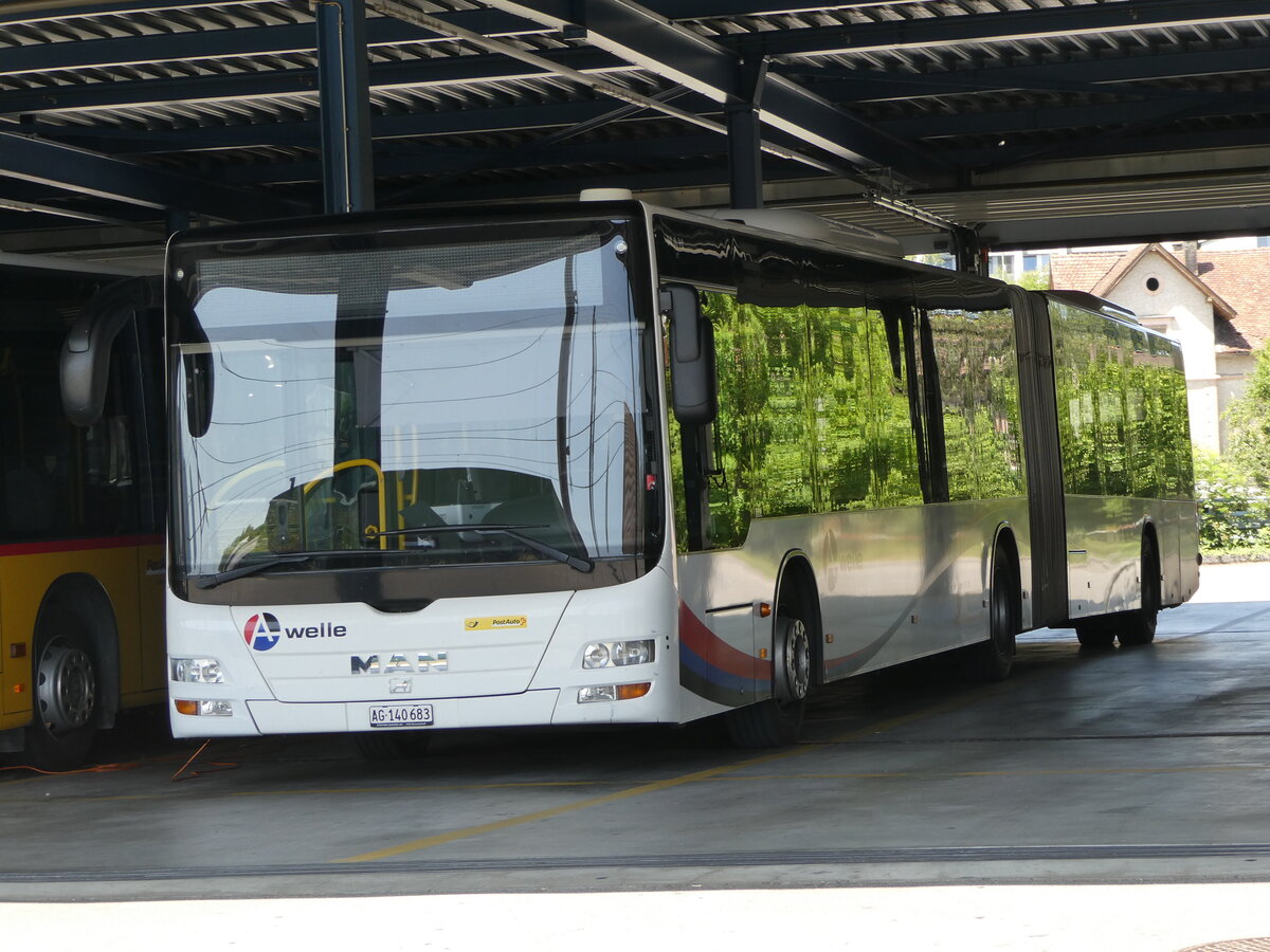 (252'414) - PostAuto Nordschweiz - AG 140'683/PID 5007 - MAN (ex Steffen, Remetschwil Nr. 58) am 7. Juli 2023 in Laufen, Garage