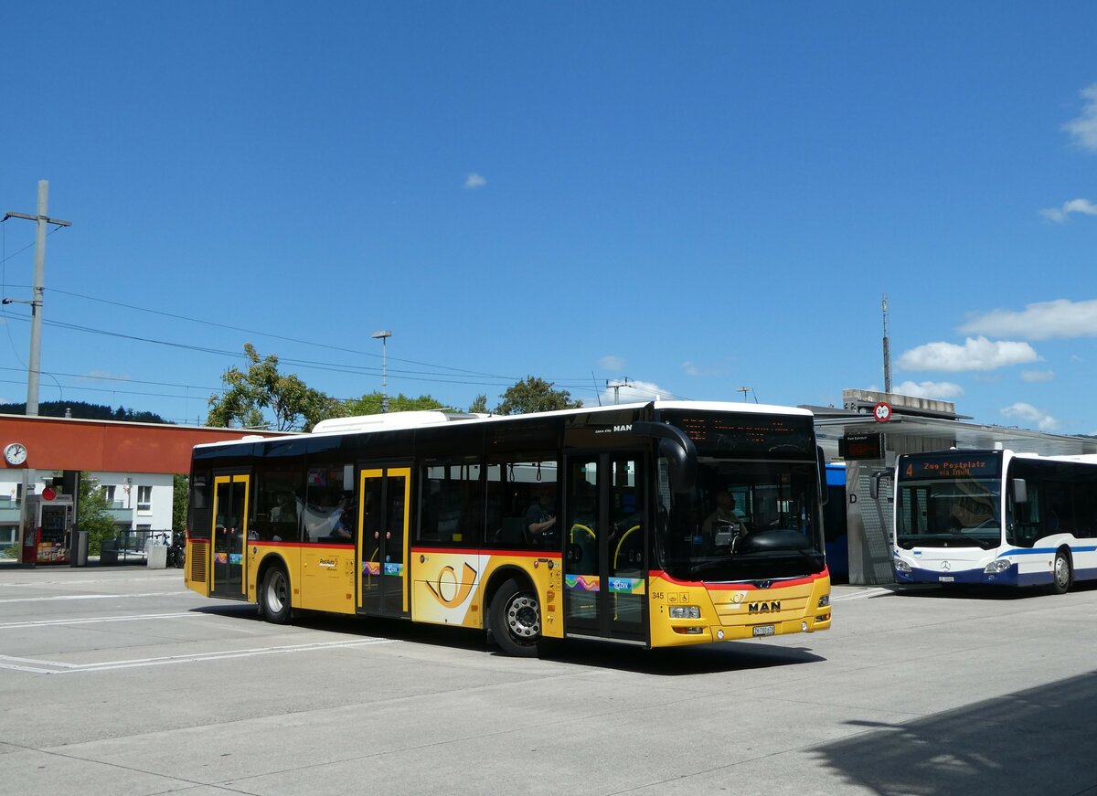 (253'350) - PostAuto Zrich - Nr. 345/ZH 780'678/PID 10'886 - MAN am 3. August 2023 beim Bahnhof Baar