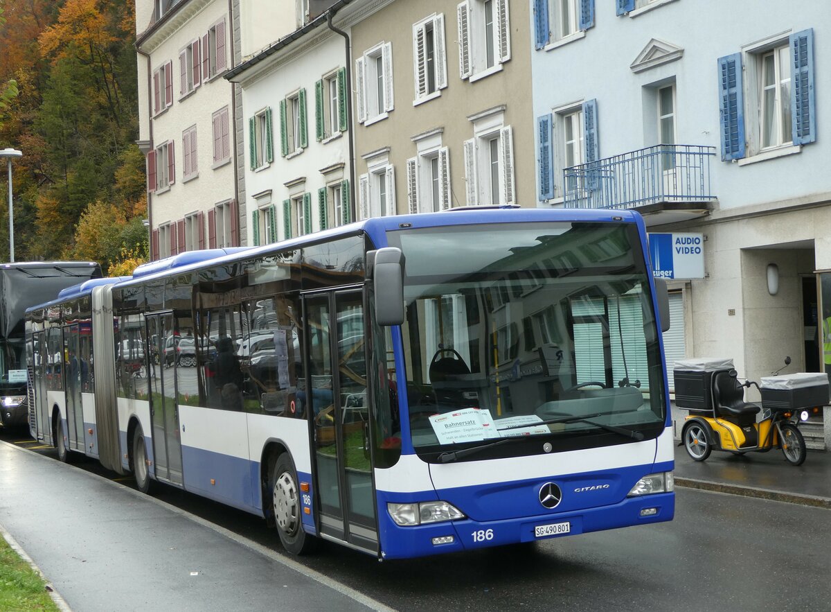 (256'599) - Domo, Glattbrugg - Nr. 6/SG 490'801 - Mercedes (ex VBZ Zrich Nr. 186; ex VZO Grningen Nr. 107) am 31. Oktober 2023 beim Bahnhof Schwanden