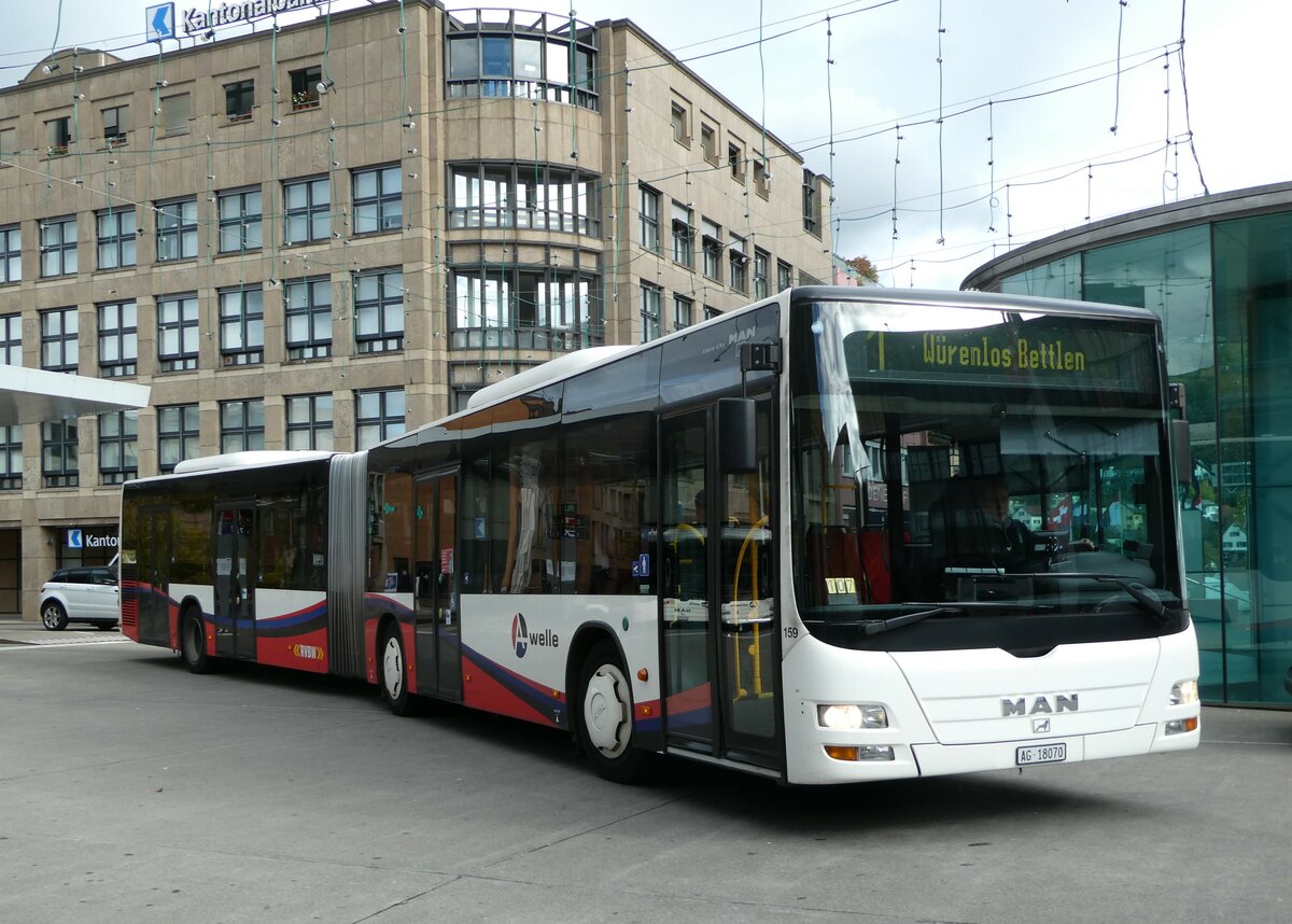 (256'740) - RVBW Wettingen - Nr. 159/AG 18'070 - MAN am 6. November 2023 beim Bahnhof Baden