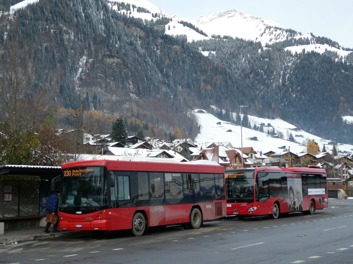 (257'240) - AFA Adelboden - Nr. 55/BE 611'055 - Scania/Hess am 27. November 2023 beim Bahnhof Frutigen