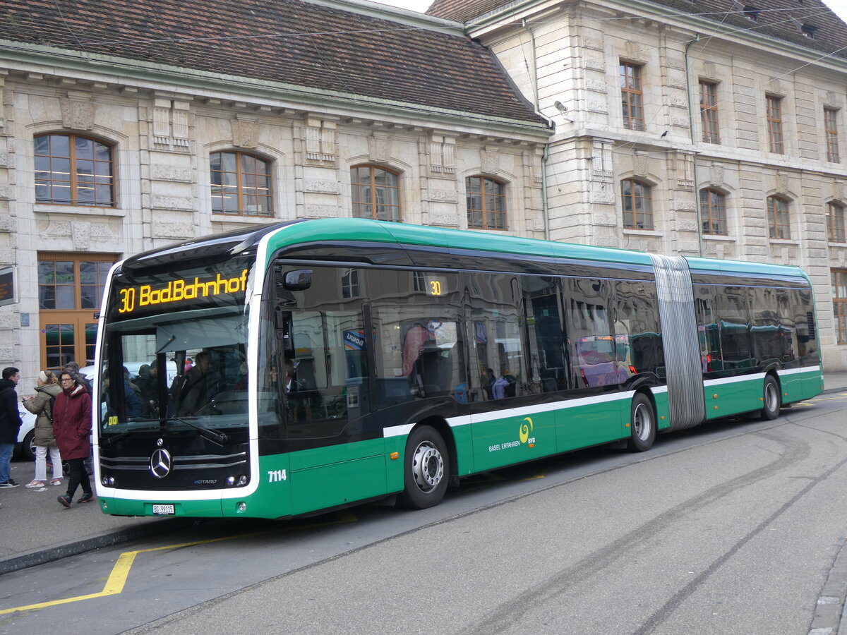 (259'018) - BVB Basel - Nr. 7114/BS 99'115 - eMercedes am 30. Januar 2024 beim Bahnhof Basel