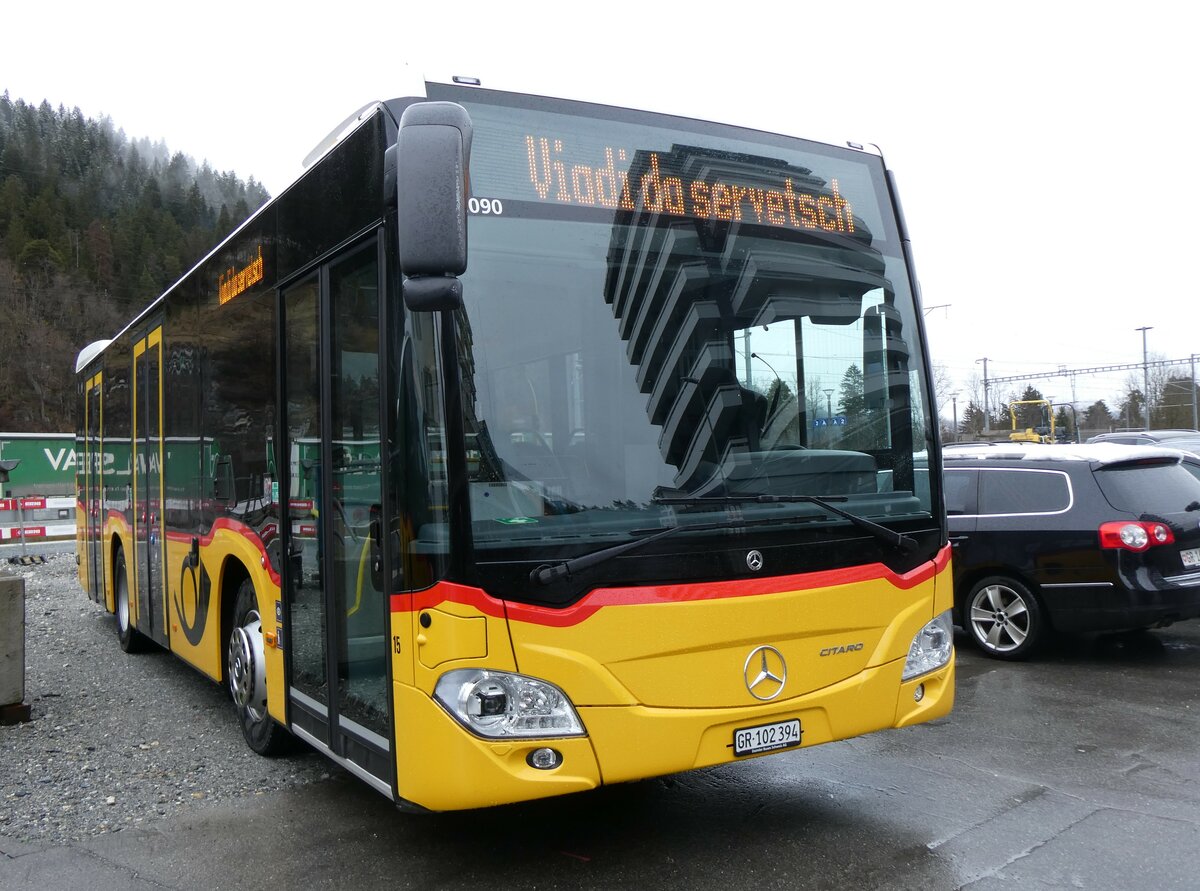 (259'554) - PostAuto Graubnden - Nr. 15/GR 102'394/PID 12'090 - Mercedes am 23. Februar 2024 beim Bahnhof Ilanz