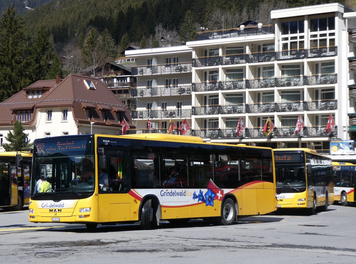 (260'541) - GrindelwaldBus, Grindelwald - Nr. 19/BE 363'305 - MAN/Gppel am 19. Mrz 2024 beim Bahnhof Grindelwald