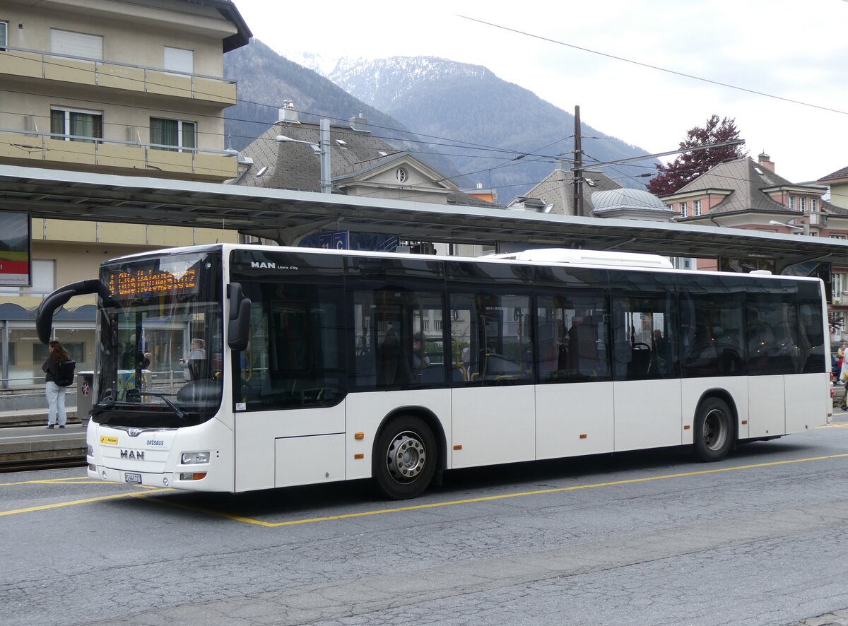 (261'835) - PostAuto Wallis - VS 449'117/PID 10'445 - MAN am 29. April 2024 beim Bahnhof Brig