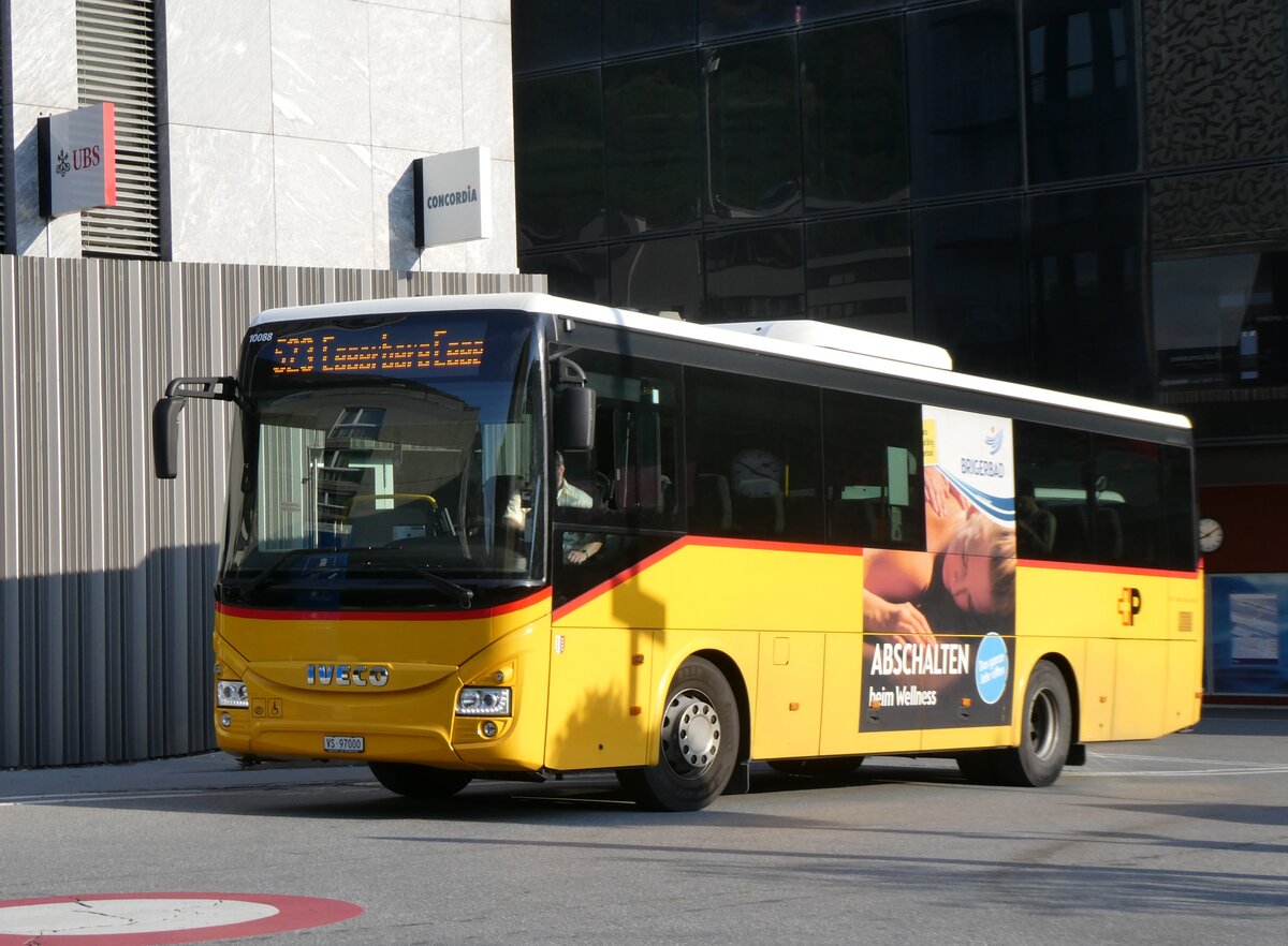 (265'097) - BUS-trans, Visp - VS 97'000/PID 10'088 - Iveco am 28. Juli 2024 beim Bahnhof Visp