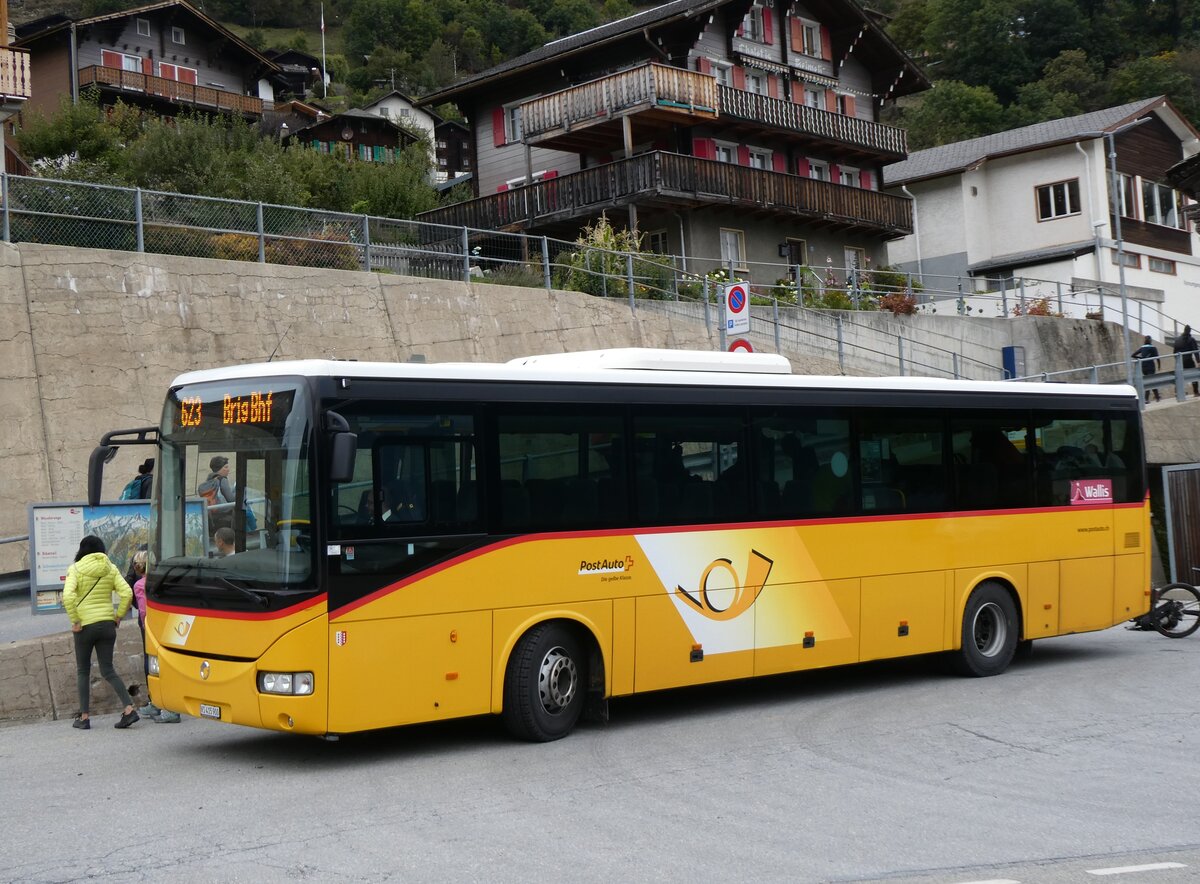 (267'754) - PostAuto Wallis - VS 415'900/PID 10'082 - Irisbus am 6. Oktober 2024 in Mund, Dorf