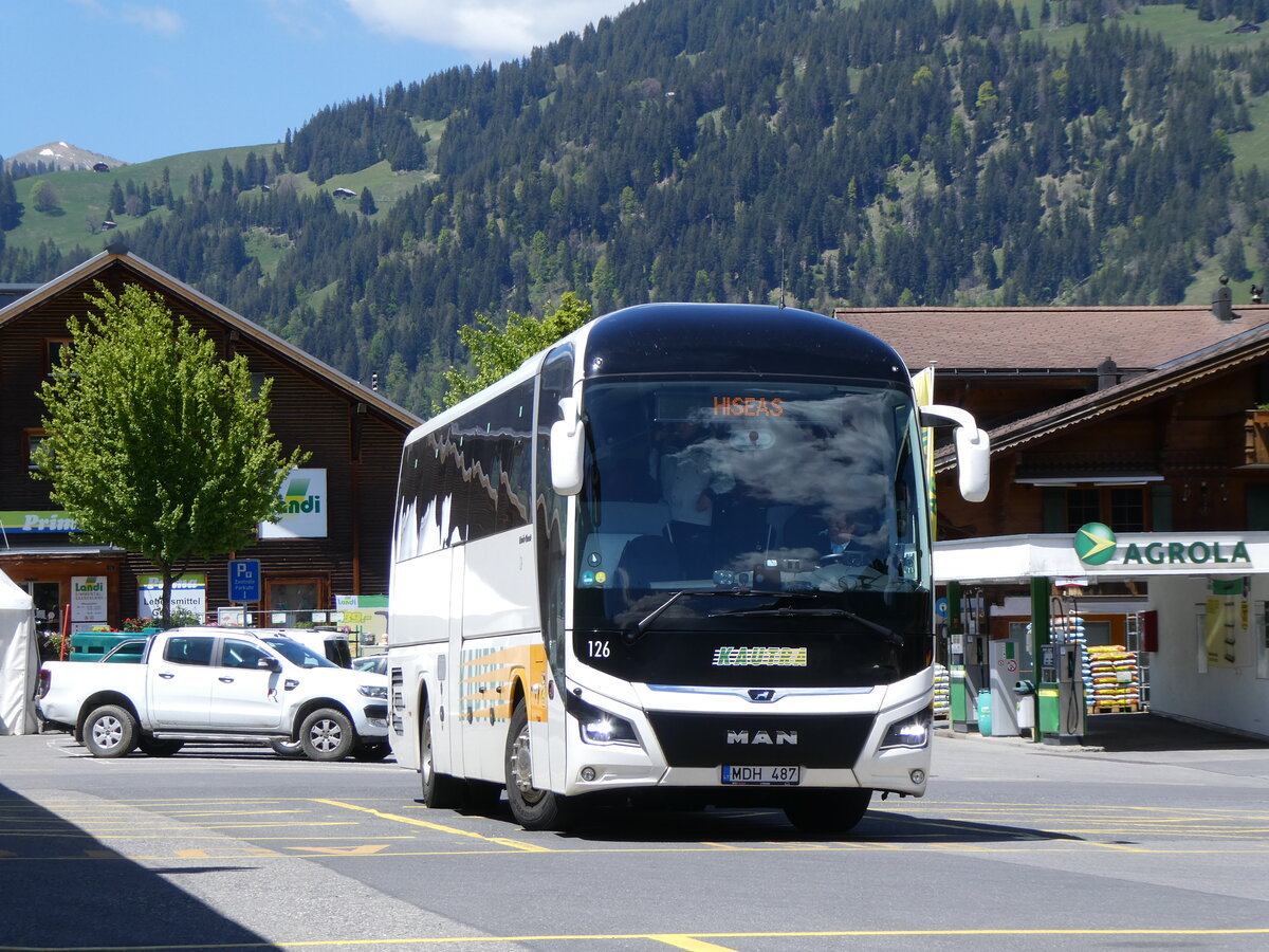 (275'614) - Aus Litauen: Jouzpaviciaus, Kaunas - Nr. 126/MDH 487 - MAN am 16. Mai 2025 beim Bahnhof Gstaad