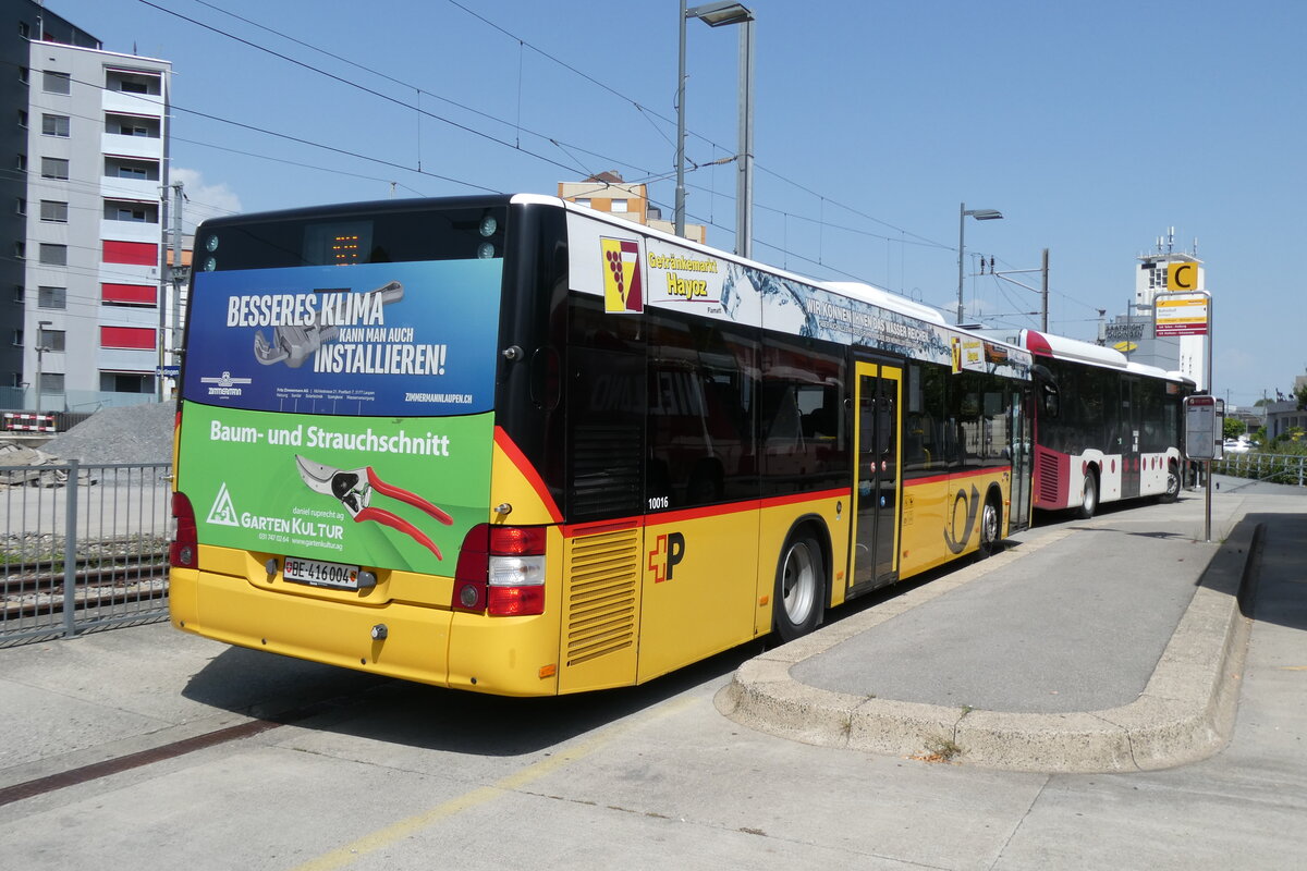 (278'896) - PostAuto Bern - Nr. 14/BE 416'004/PID 10'016 - MAN (ex Klopfstein, Laupen Nr. 4) am 15. August 2025 beim Bahnhof Ddingen 
