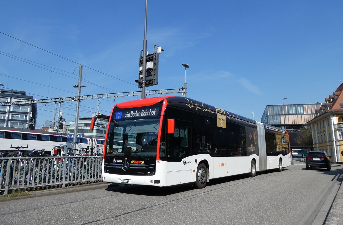 (285'550) - RVBW Wettingen - Nr. 113/AG 599'374 - eMercedes am 19. M�rz 2026 beim Bahnhof Baden
