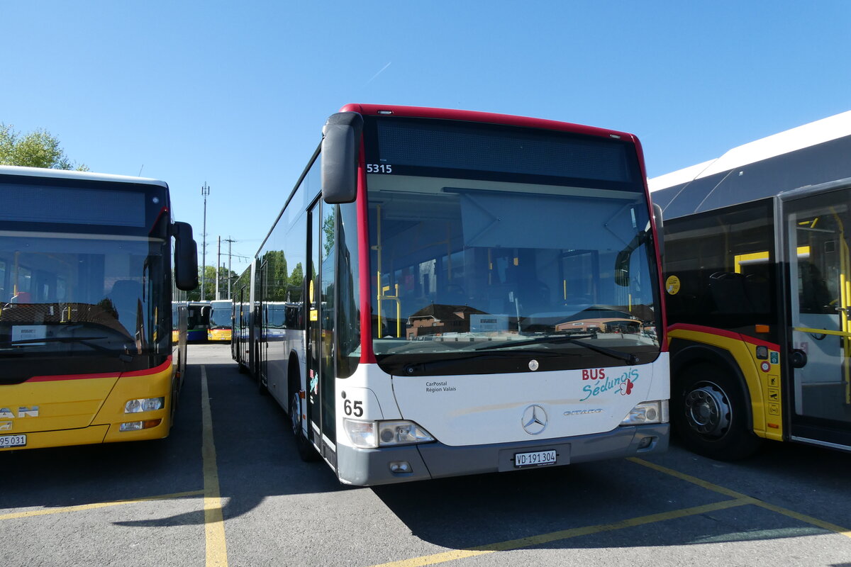 (286'377) - CarPostal Ouest - Nr. 65/VD 191'304/PID 5315 - Mercedes (ex PostAuto Wallis Nr. 65; ex Lathion, Sion Nr. 65) am 25. April 2026 in Yverdon, Garage