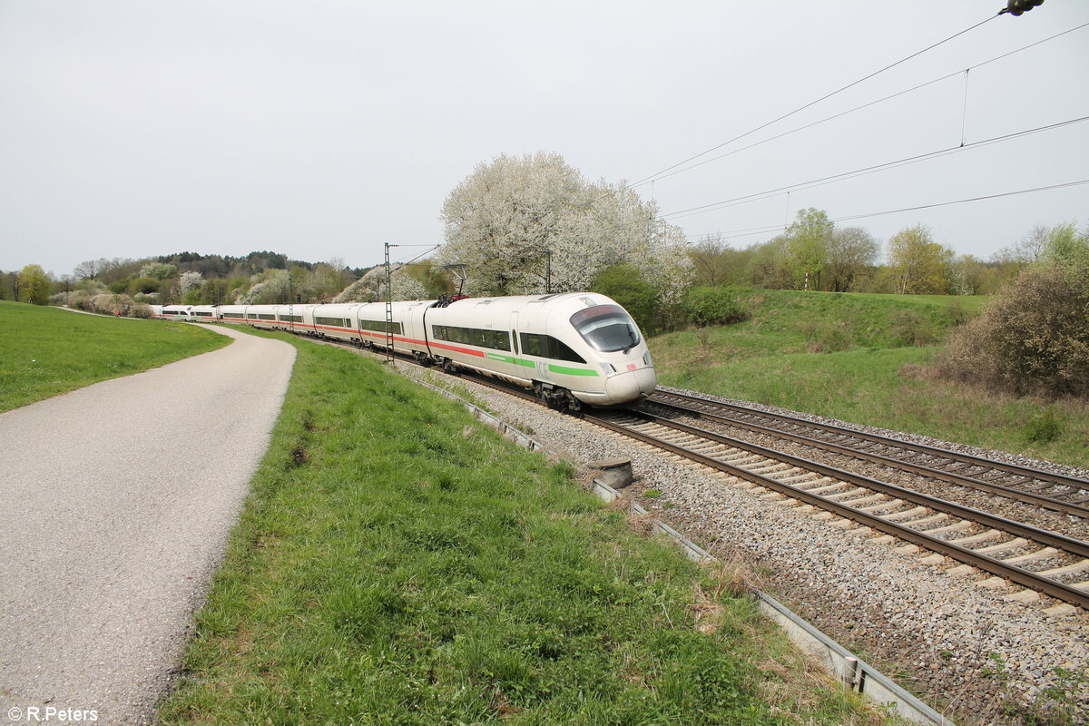 411 070-6  Prenzlau  und 411 056  Waren (Müritz)  als ICE 91 Hamburg - Wien  Donauwalzer  bei Pölling. 07.04.24