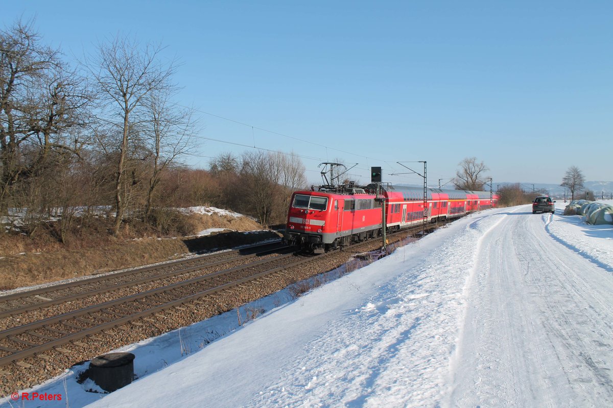 RE 4861 Nürnberg - München wurde von 111 185-5 bei Pölling geschoben. 26.01.17