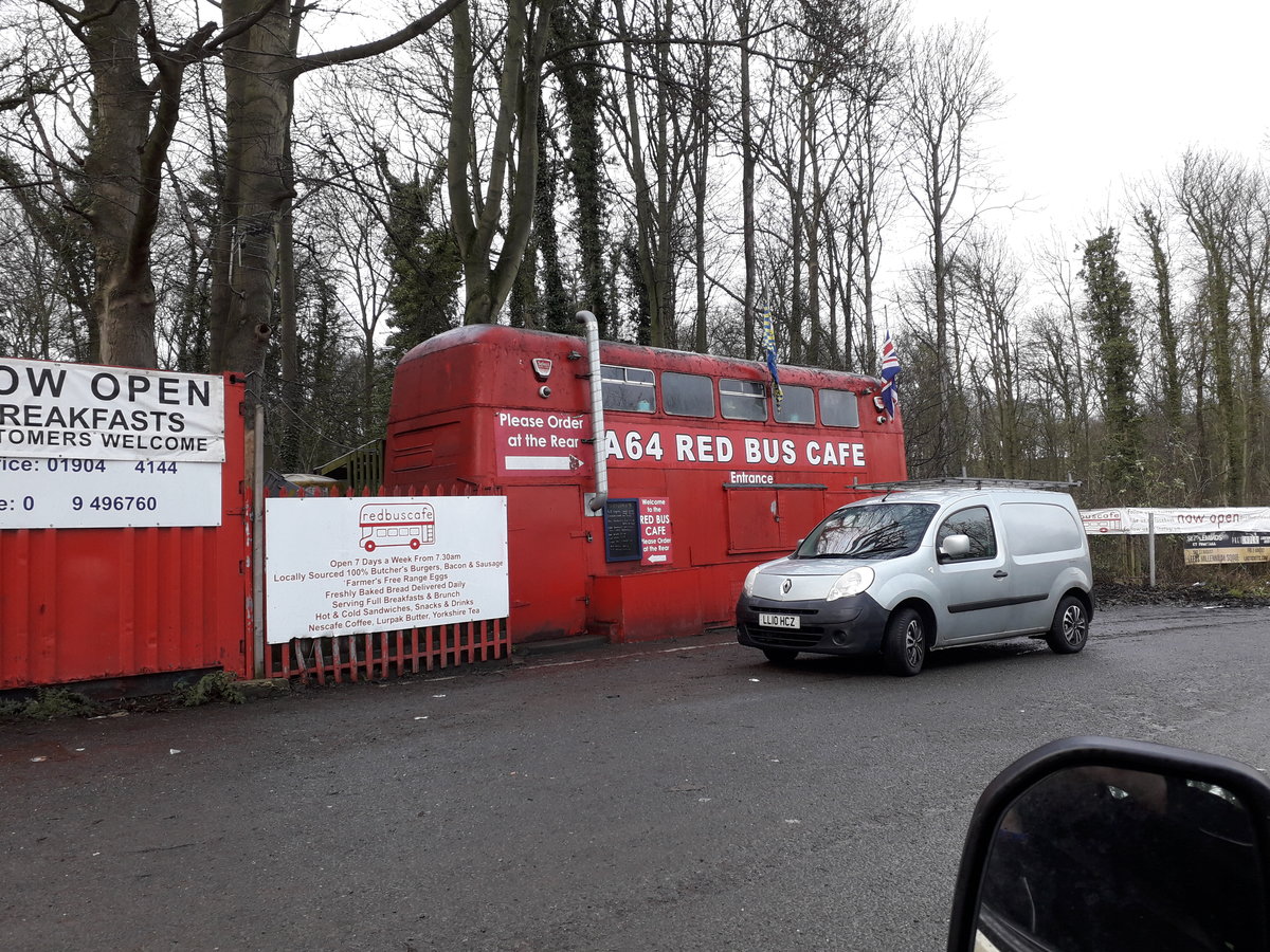 The famous  A64 Red Bus Cafe , situated on the outskirts of Leeds, West Yorkshire, UK, started life with Newcastle Corporation in 1968 as an Alexander H45/30D bodied Leyland Atlantean, registered SVK 607G.  After passing through various operators, it was converted into a static cafe, as seen here.

Photographed on York Road, Leeds, LS14 3AE on Monday 4th January 2021.